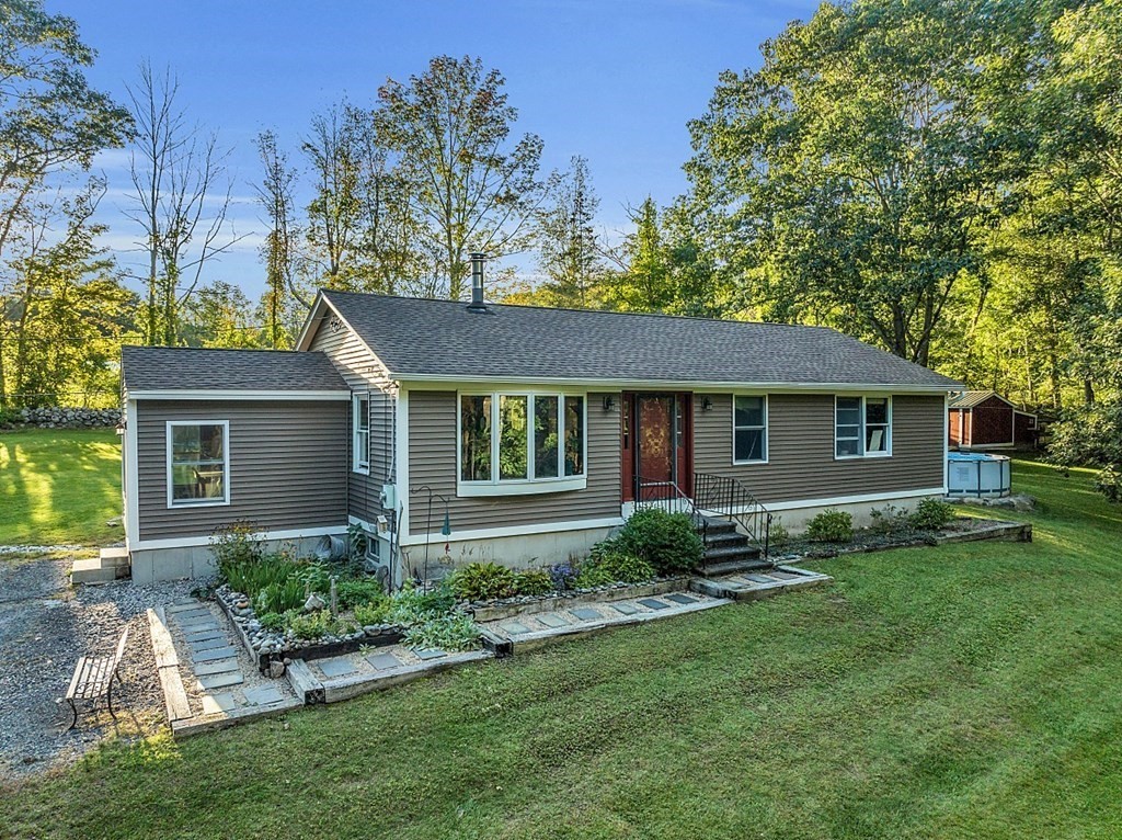 10 Whitney Road Phillipston, MA 01331 - Photo 4 of 41 a front view of a house with garden