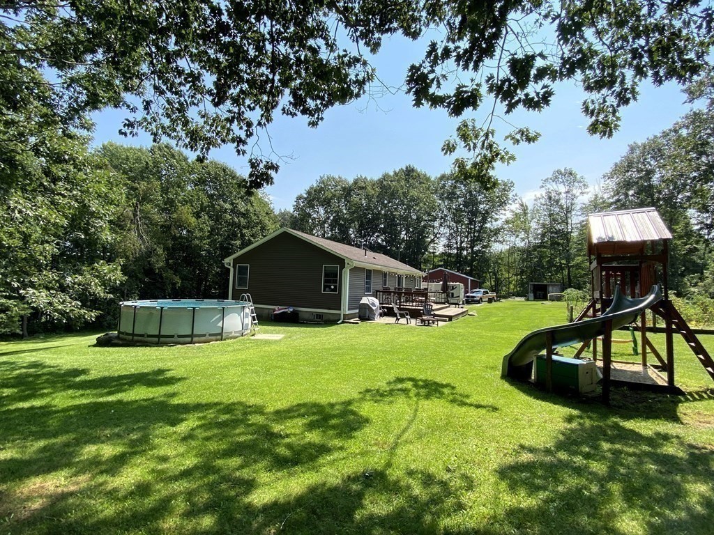 10 Whitney Road Phillipston, MA 01331 - Photo 41 of 41 a view of a house with a yard porch and sitting area