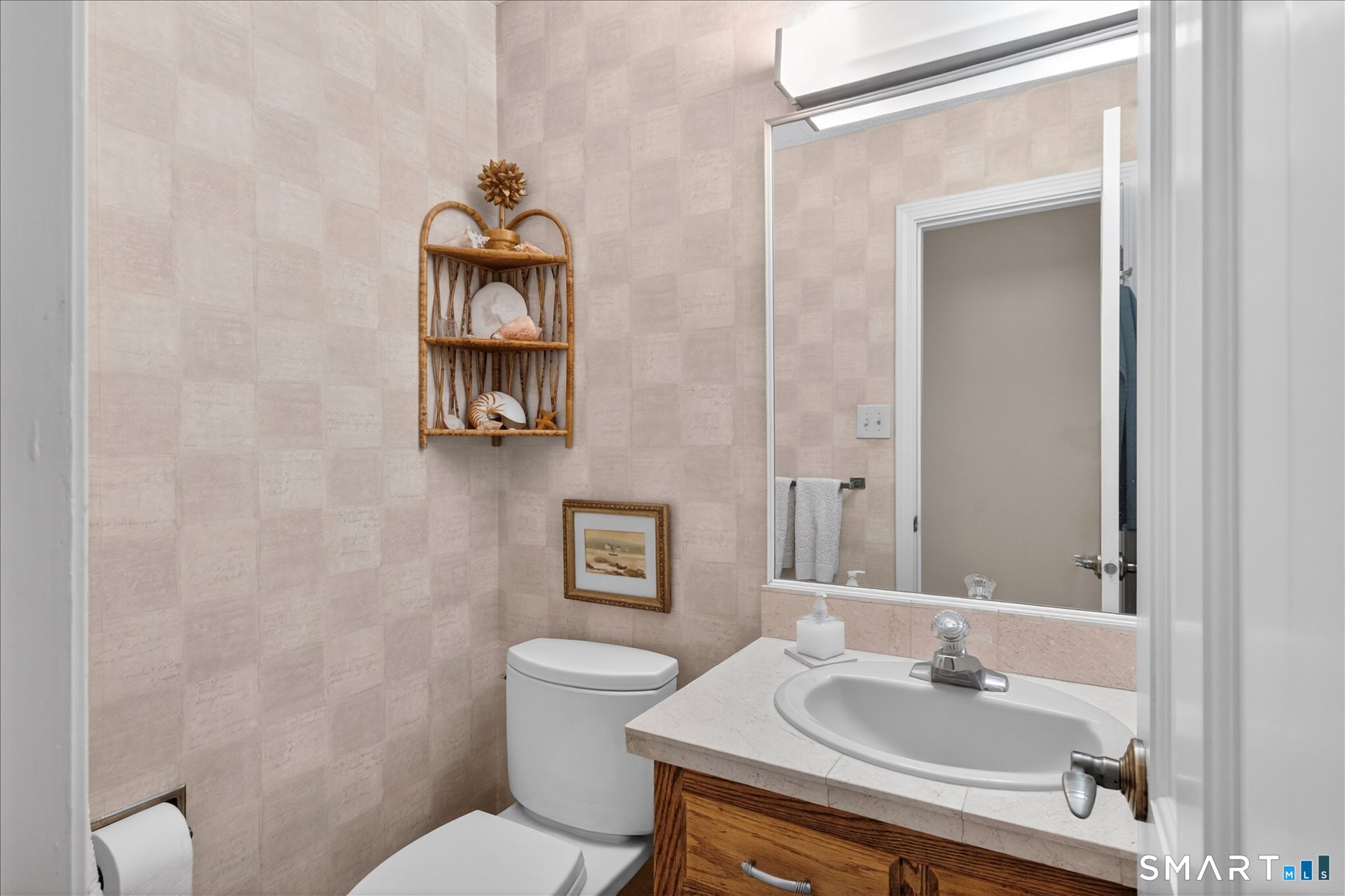 5 Shingle Mill Drive Canton, CT 06019 - Photo 23 of 38 a bathroom with a sink and a mirror