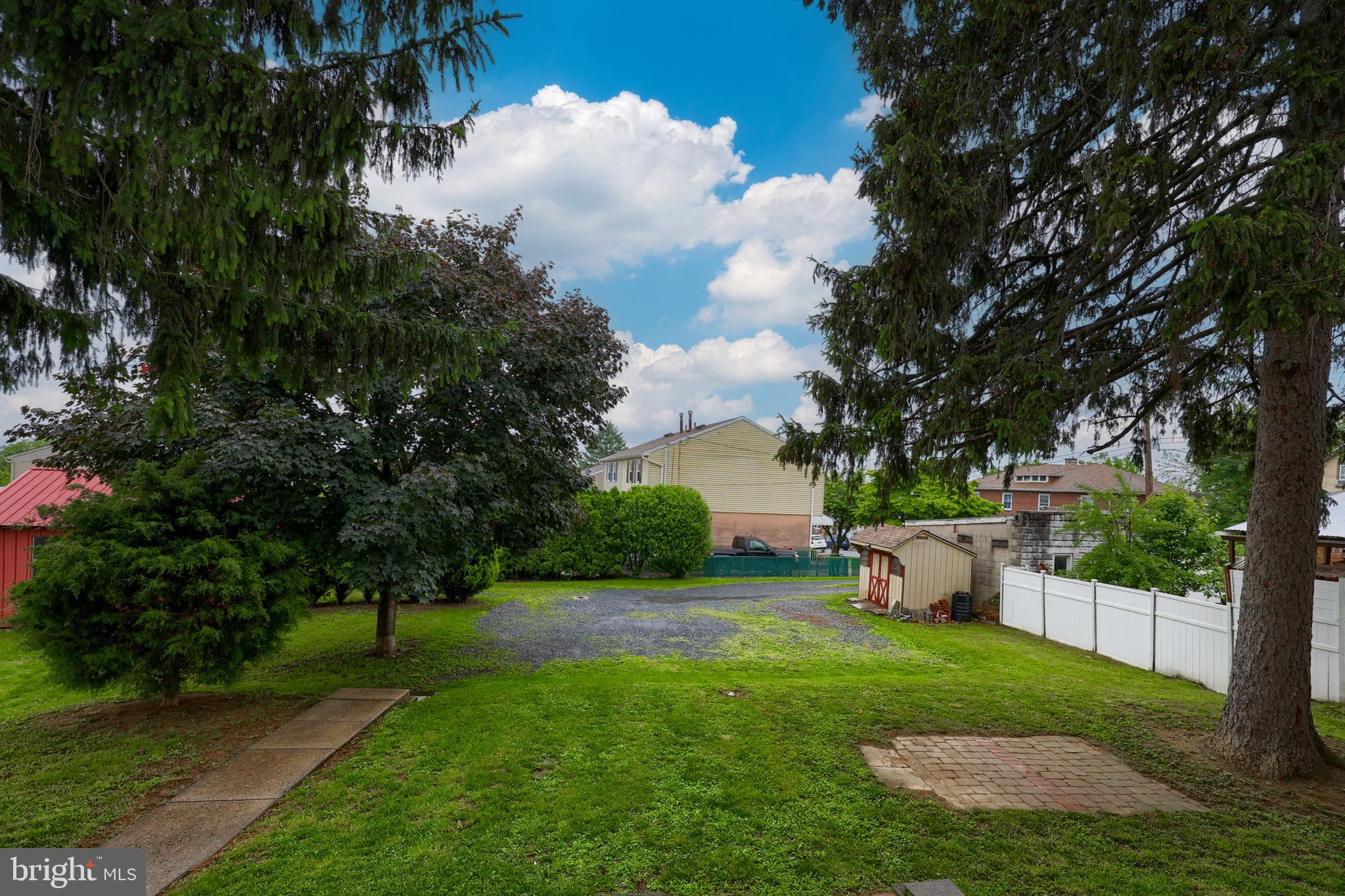2926 Kutztown Road Reading, PA 19605 - Photo 11 of 49 a view of a garden with a fountain