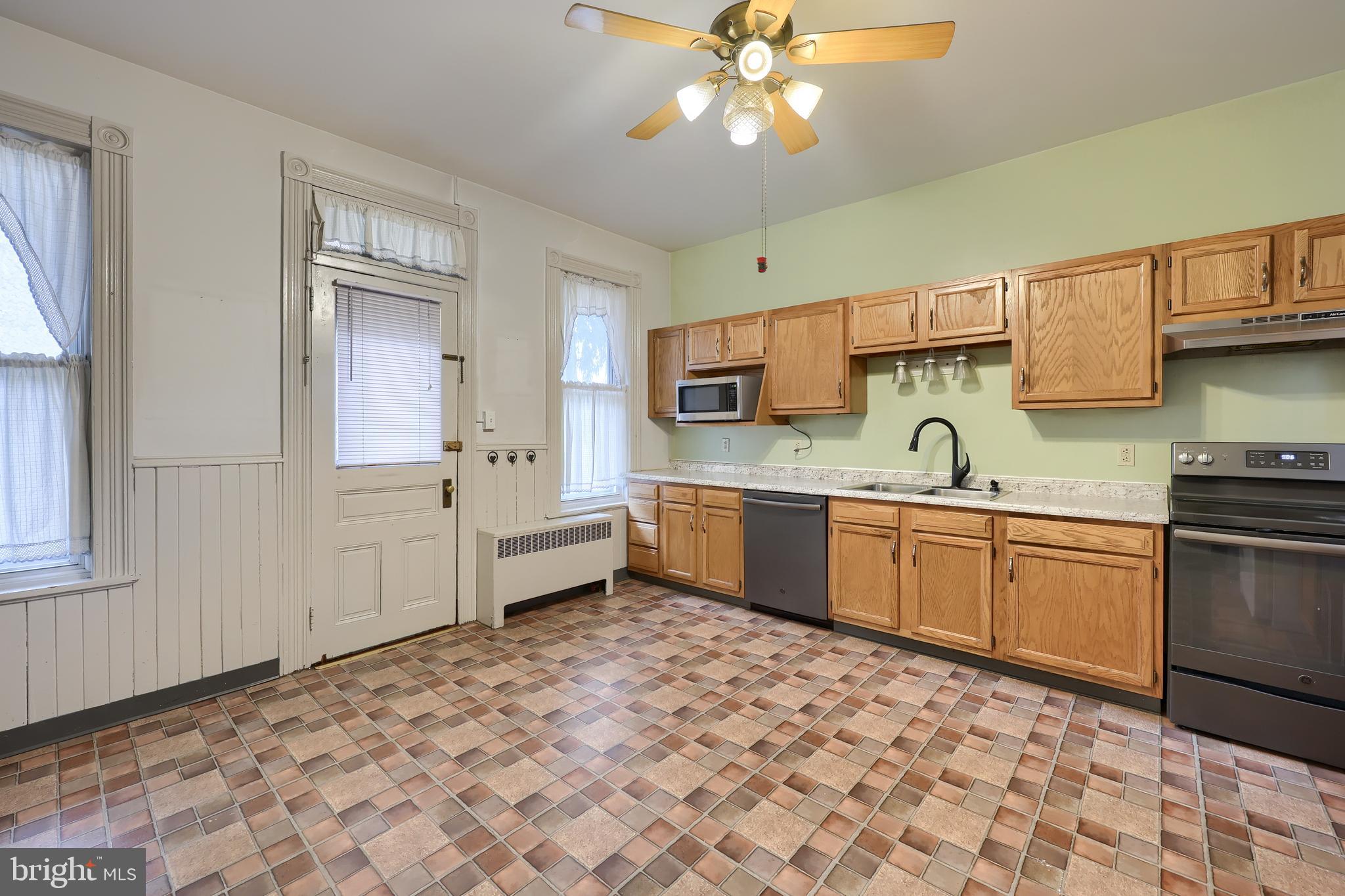 2926 Kutztown Road Reading, PA 19605 - Photo 12 of 49 a kitchen with a sink cabinets and window