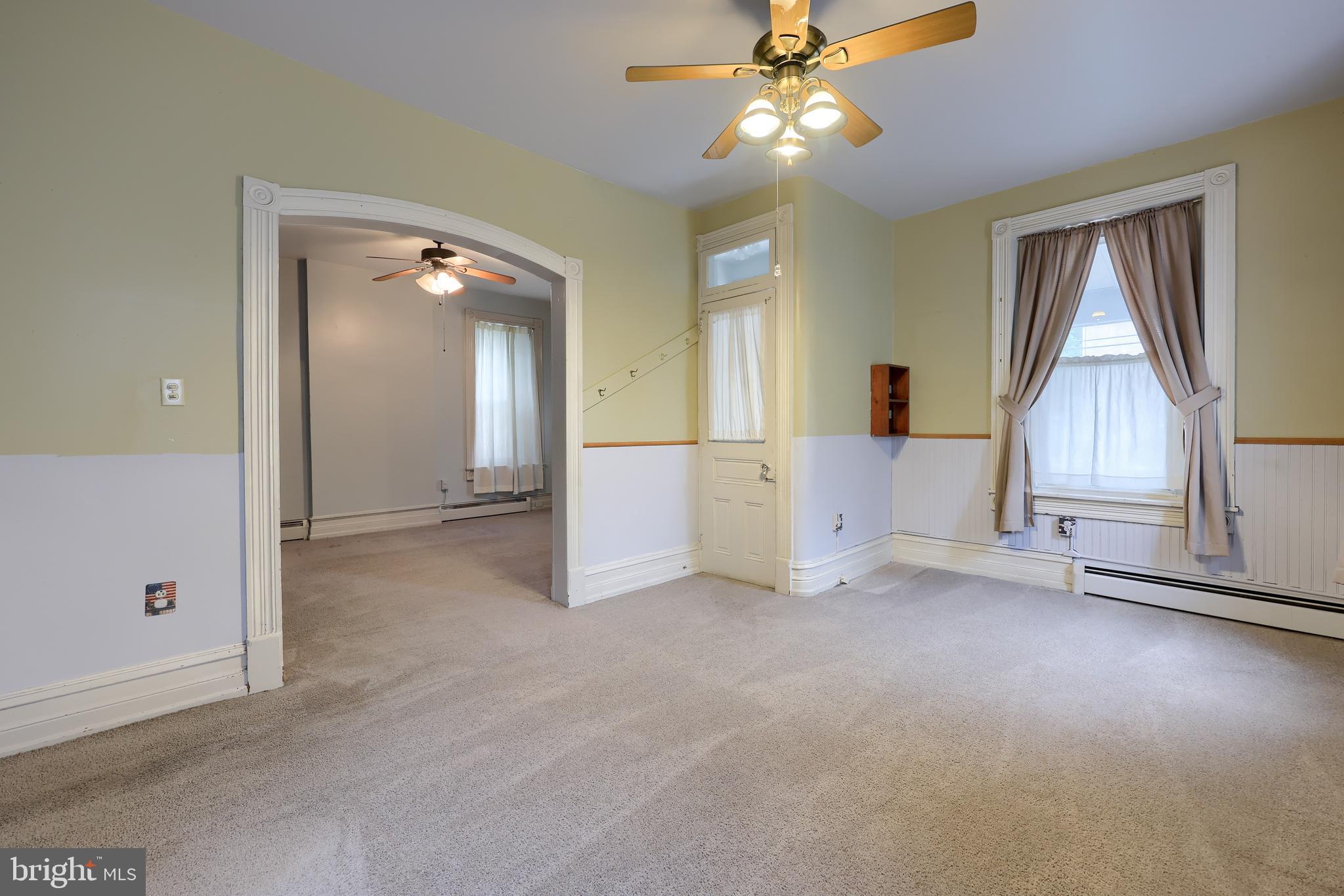 2926 Kutztown Road Reading, PA 19605 - Photo 18 of 49 an empty room with windows and fan