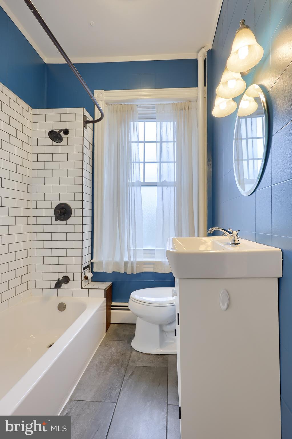 2926 Kutztown Road Reading, PA 19605 - Photo 24 of 49 a bathroom with a sink a toilet and a bathtub