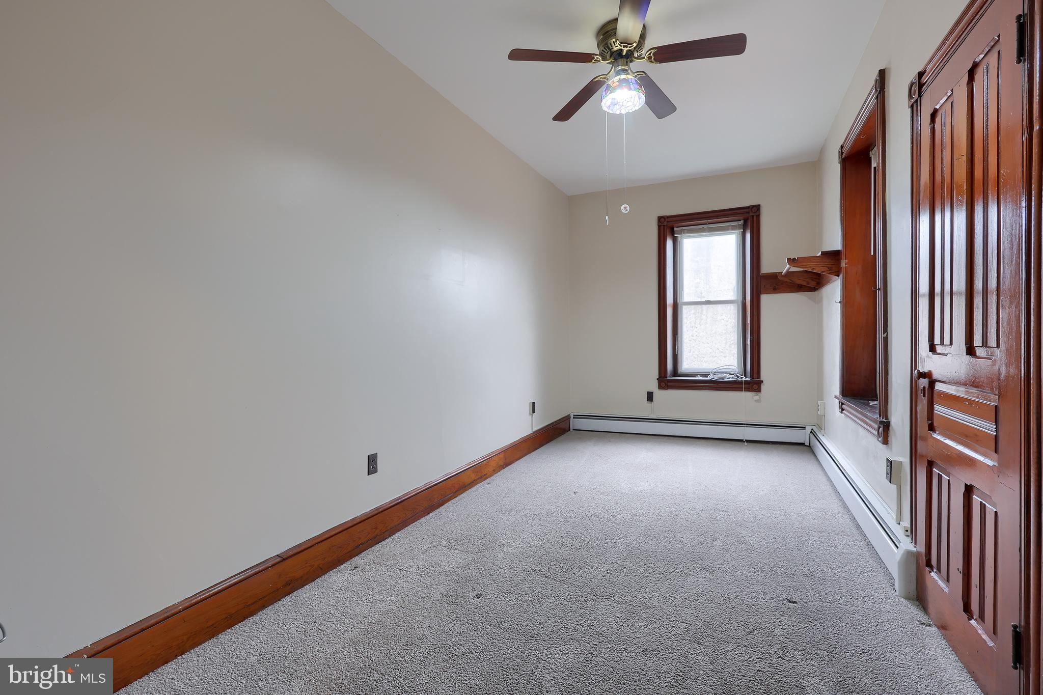2926 Kutztown Road Reading, PA 19605 - Photo 29 of 49 a view of a livingroom with a ceiling fan and window