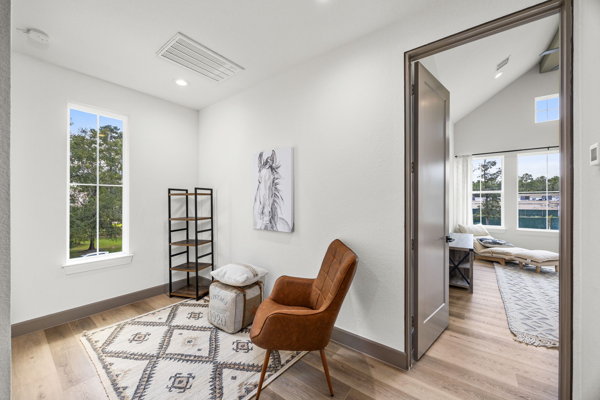 7934 Hennessy Lane, Unit 3 Spring, TX 77389 - Photo 22 of 36 a living room with furniture and a window