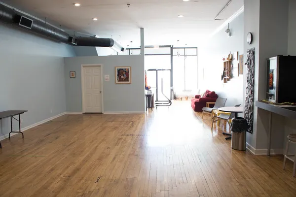 a view of a living room and dining room