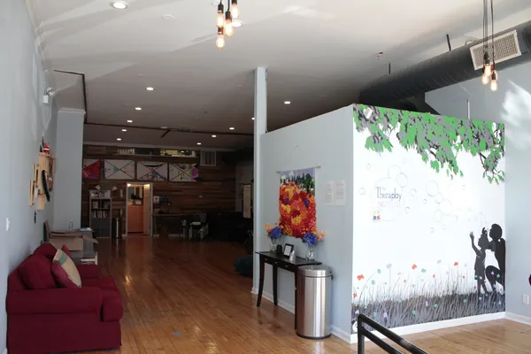 a view of a living room and dining room
