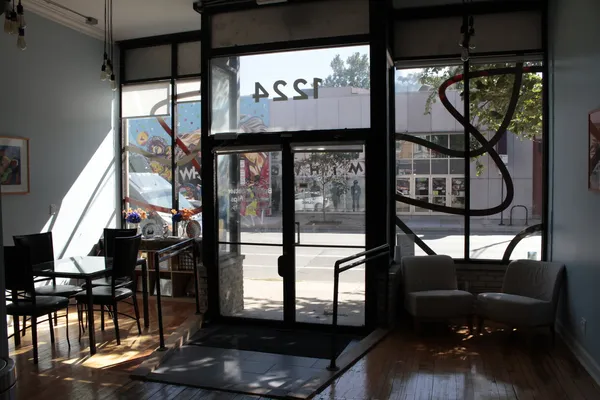 a view of entryway and hall with dining area