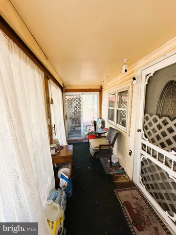 a dining room with a table and chairs
