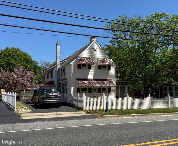 a front view of a house with a garage