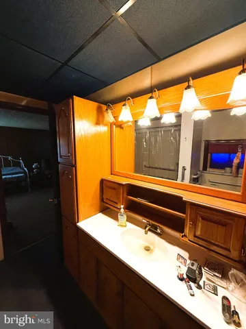 a bedroom with bed and window