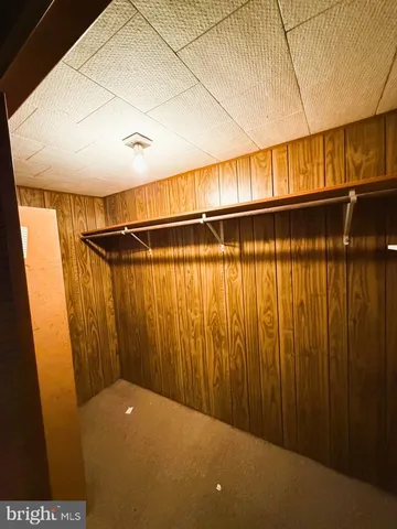a view of a livingroom with furniture and window