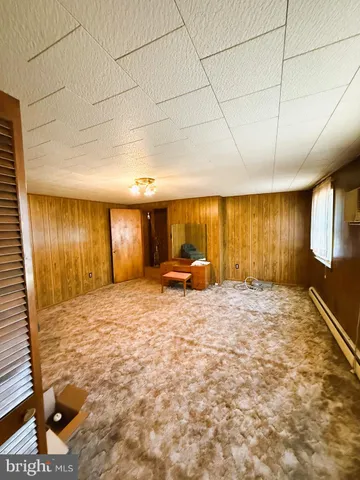a view of front door with wooden floor