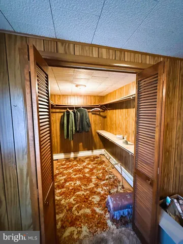 a living room with hard wood floor