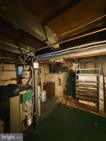 a view of a livingroom with furniture and windows