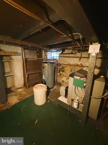 a living room with furniture a rug and a large window