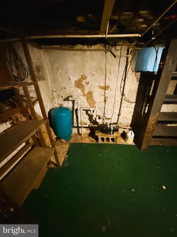 a bathroom with a sink mirror and toilet
