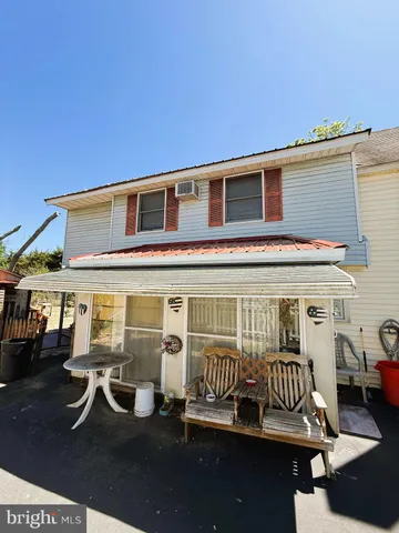 a view of a house with patio