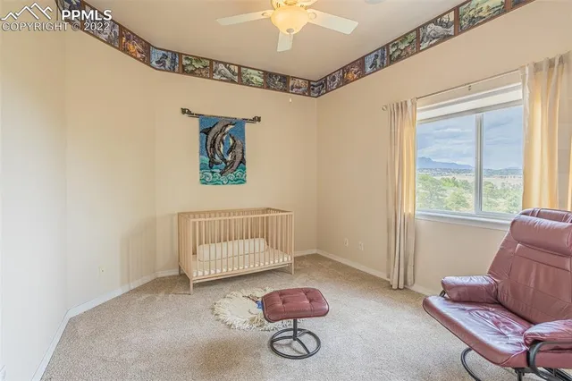 an aerial view of a house with outdoor space