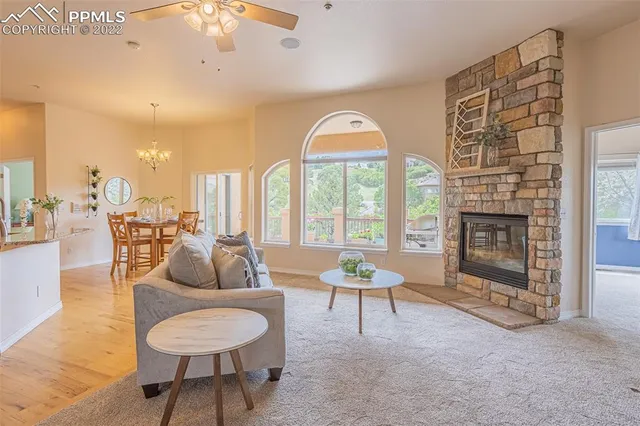 a kitchen with stainless steel appliances granite countertop sink stove top oven and cabinets