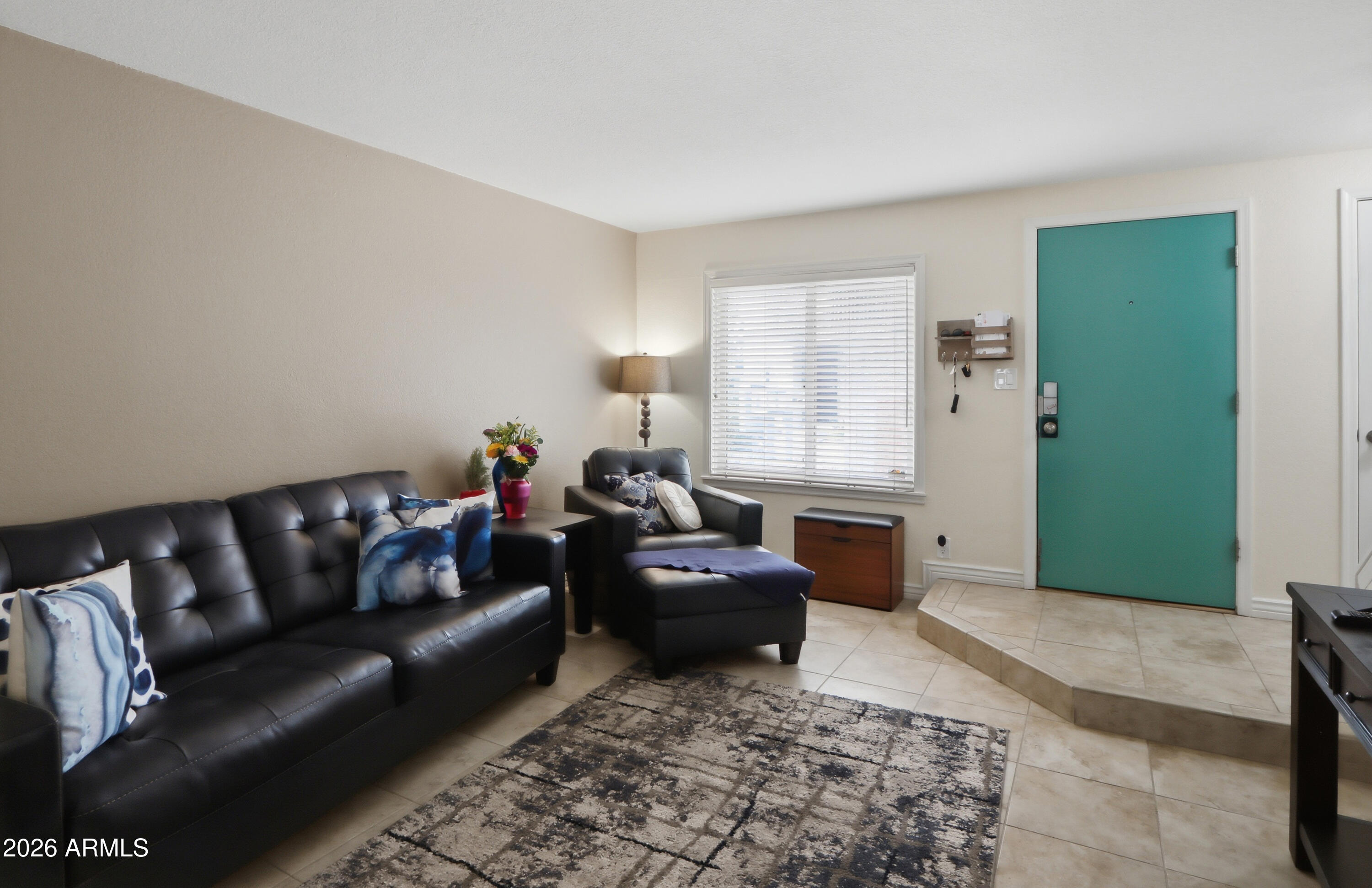 1402 East Osborn Road, Unit 2 Phoenix, AZ 85014 - Photo 5 of 29 a living room with furniture and a couch