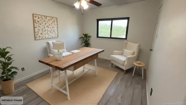 a workspace with furniture and window