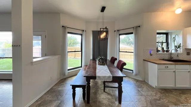 a view of dining room and window