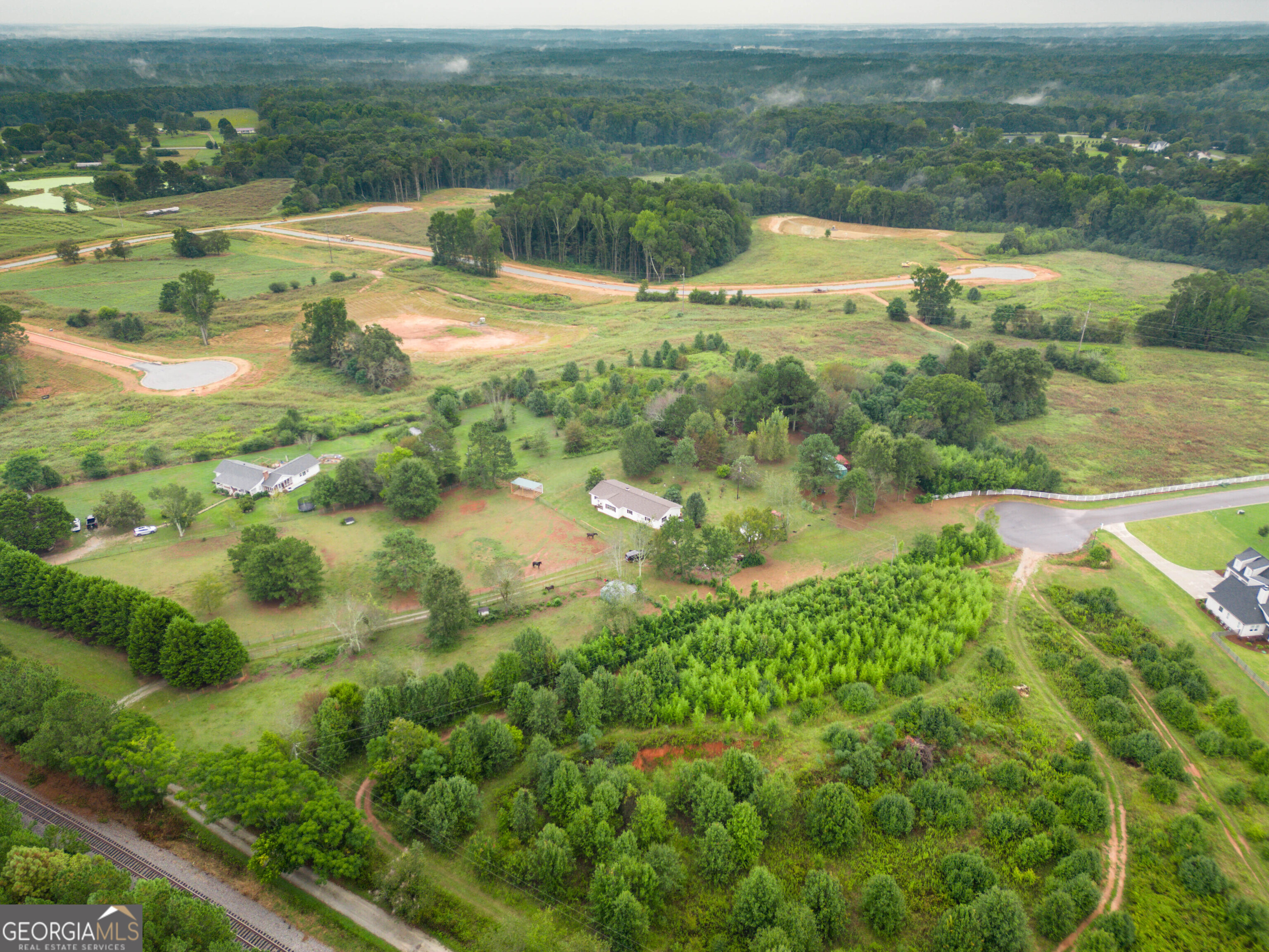 2141 Greensboro Road Madison, GA 30650 - Photo 4 of 35 a view of lake with green space
