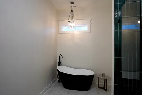 a bathroom with a toilet and a sink