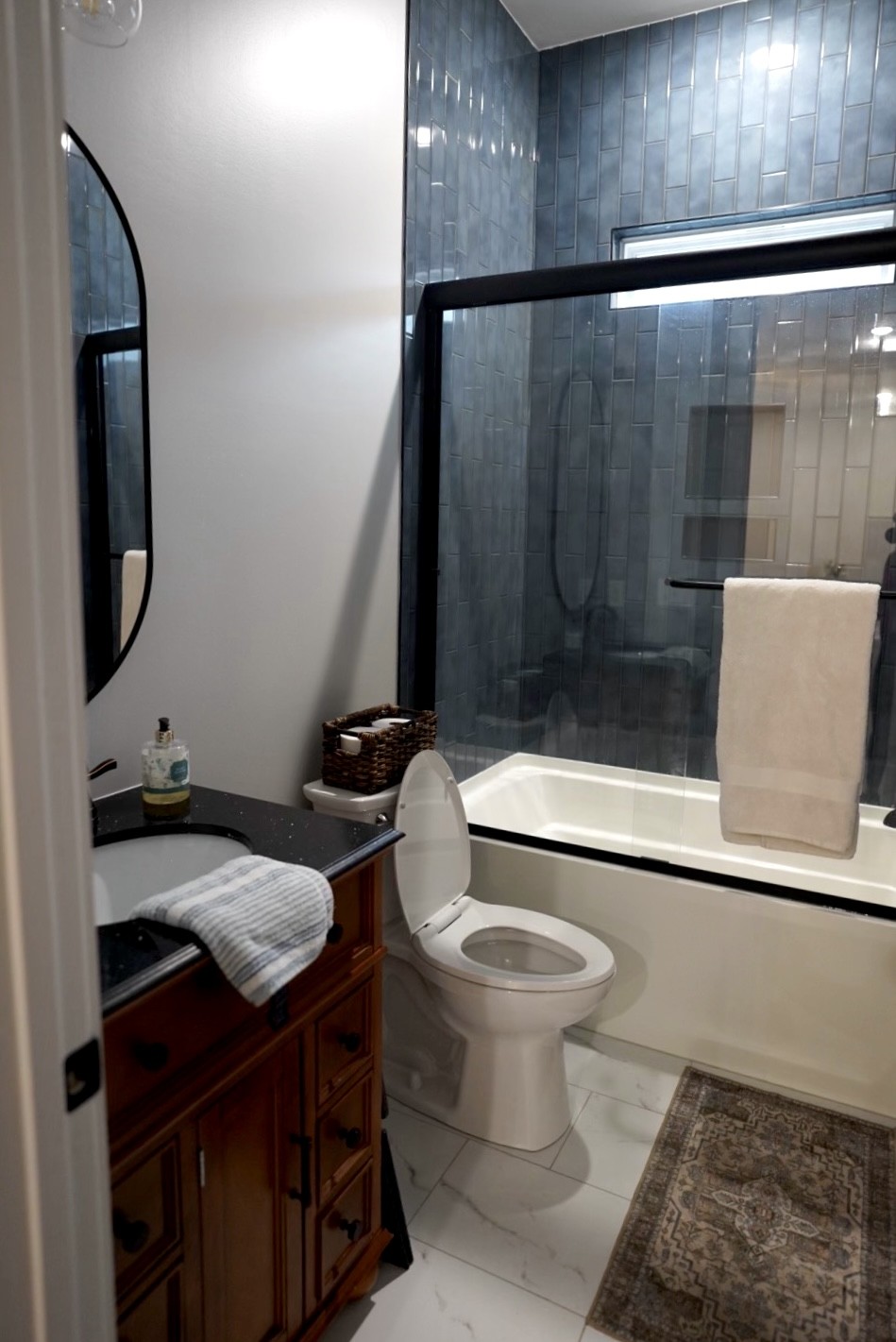 807 North Maple Street Murfreesboro, TN 37130 - Photo 16 of 16 a bathroom with a sink a toilet and shower