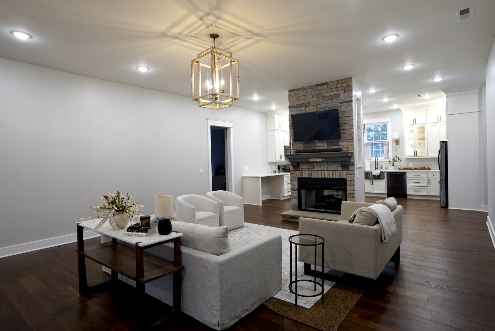 807 North Maple Street Murfreesboro, TN 37130 - Photo 4 of 16 a living room with furniture a fireplace and a flat screen tv