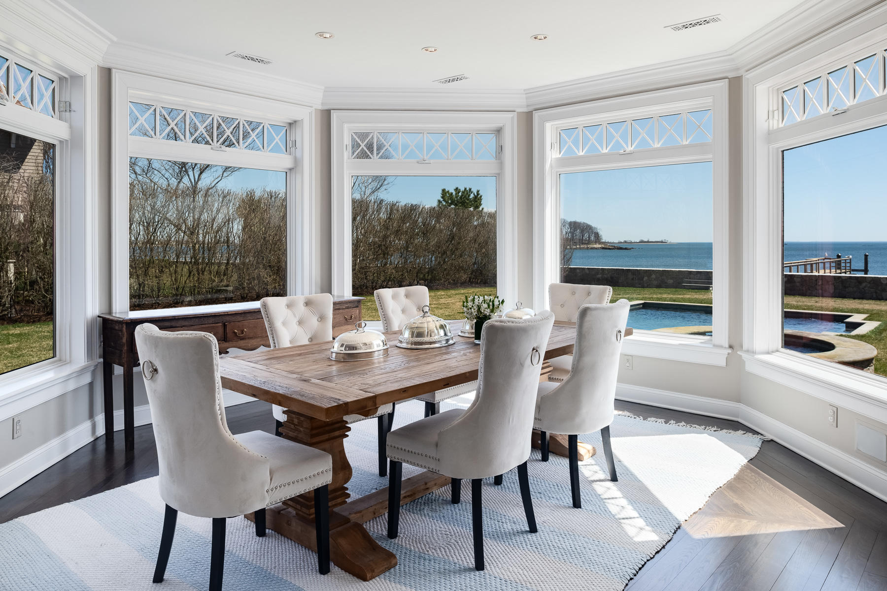 8 Shorehaven Road Norwalk, CT 06855 - Photo 11 of 27 a view of a dining room with furniture window and wooden floor