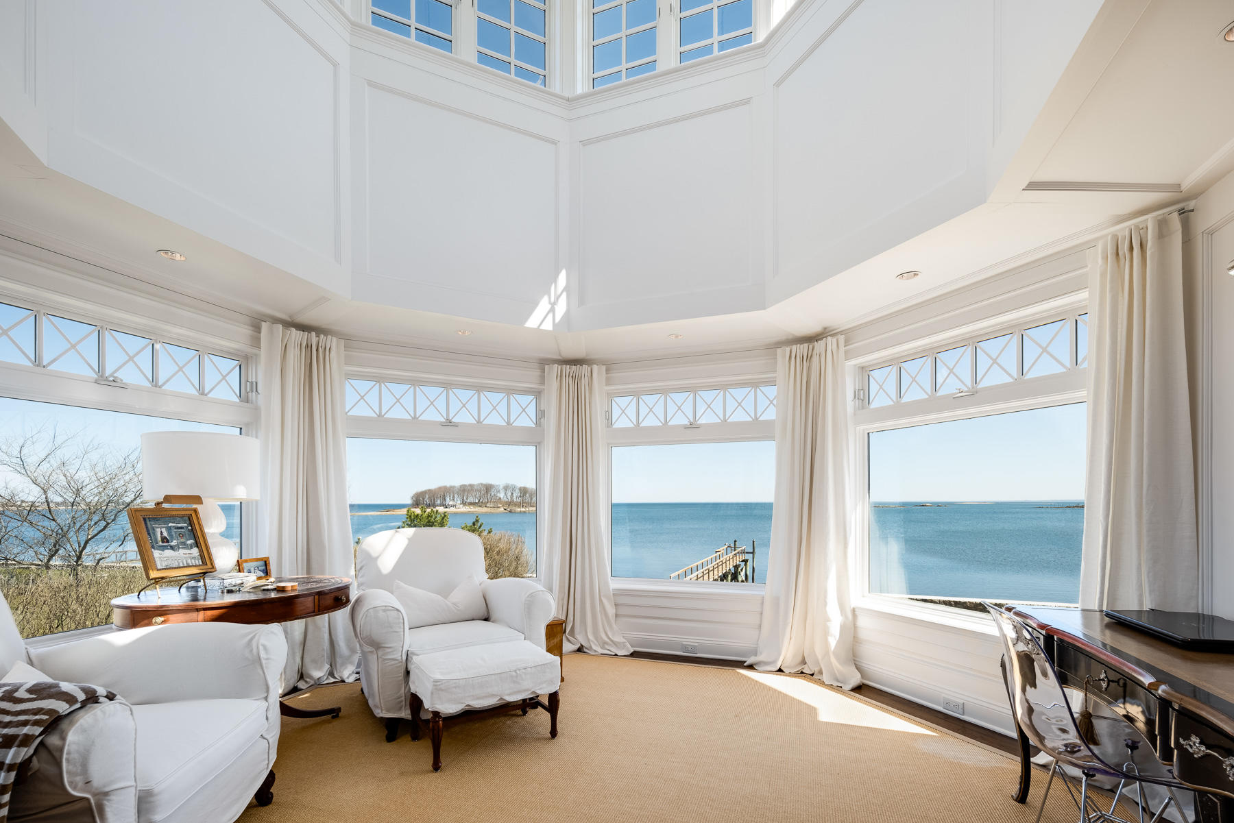 8 Shorehaven Road Norwalk, CT 06855 - Photo 16 of 27 a bedroom with furniture and a large window