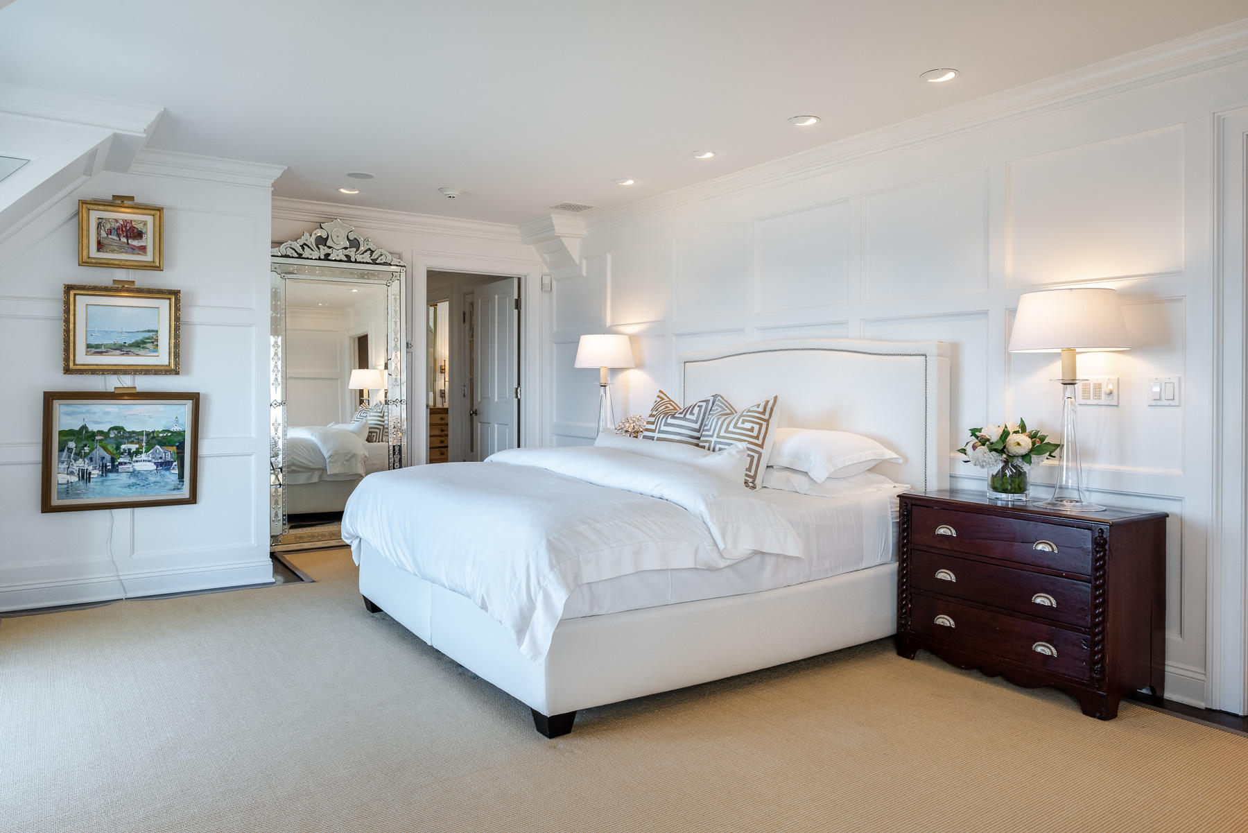 8 Shorehaven Road Norwalk, CT 06855 - Photo 17 of 27 a spacious bedroom with a bed and a painting on the wall