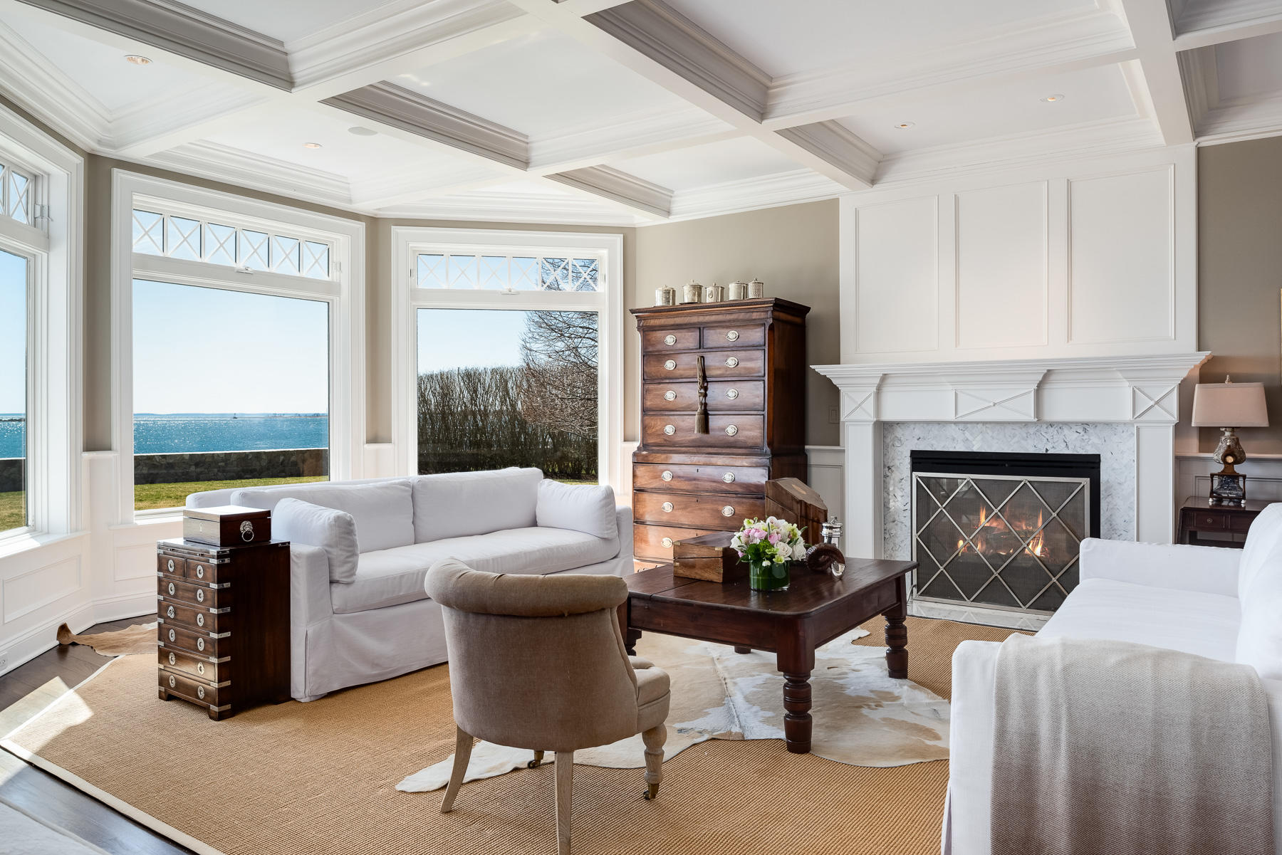 8 Shorehaven Road Norwalk, CT 06855 - Photo 8 of 27 a living room with furniture potted plant a fireplace and a window