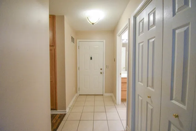 a view of an entryway with a livingroom