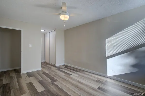a view of a livingroom with wooden floor