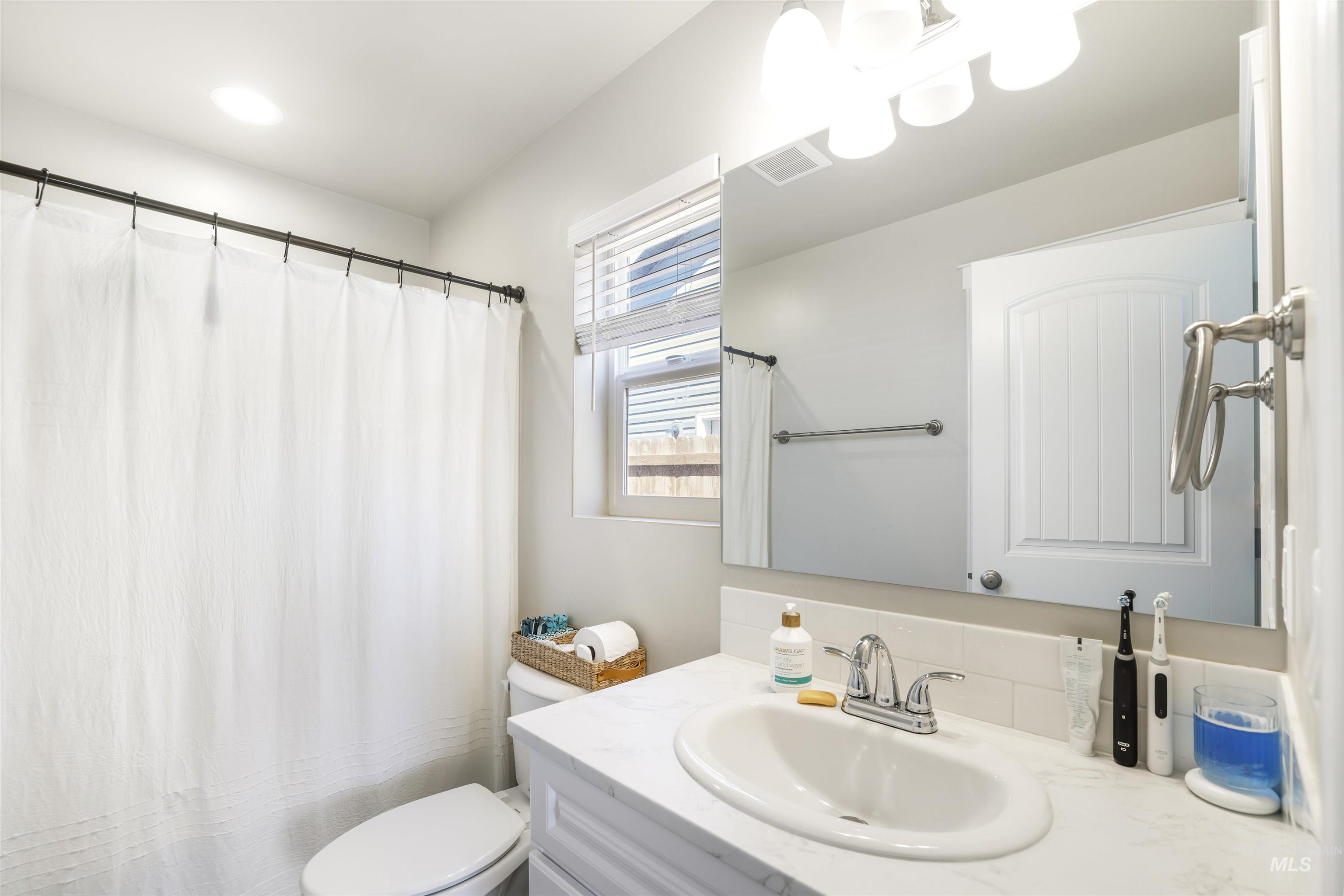 1113 Meadow Lake Loop Buhl, ID 83316 - Photo 12 of 15 Bathroom with vanity and toilet