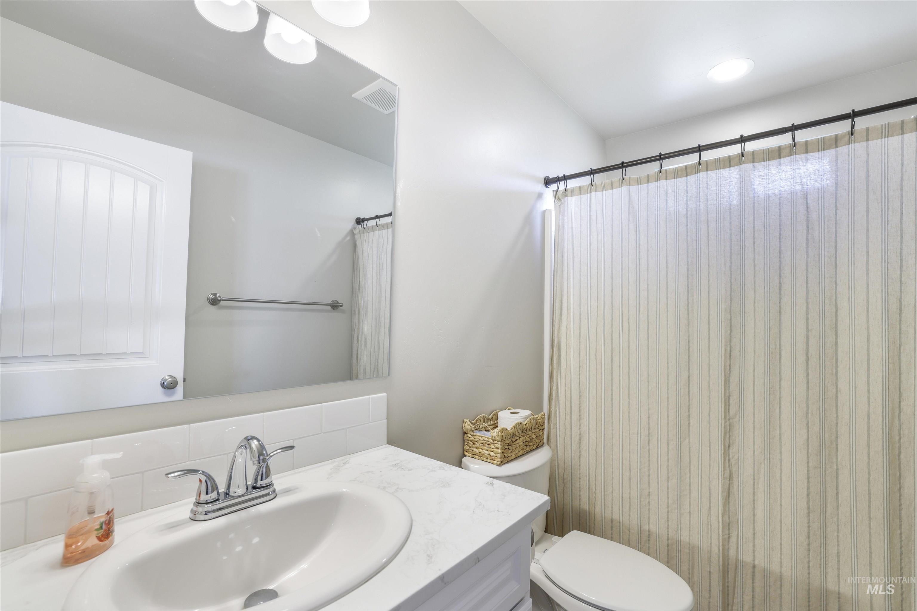 1113 Meadow Lake Loop Buhl, ID 83316 - Photo 10 of 15 Bathroom featuring vanity and toilet