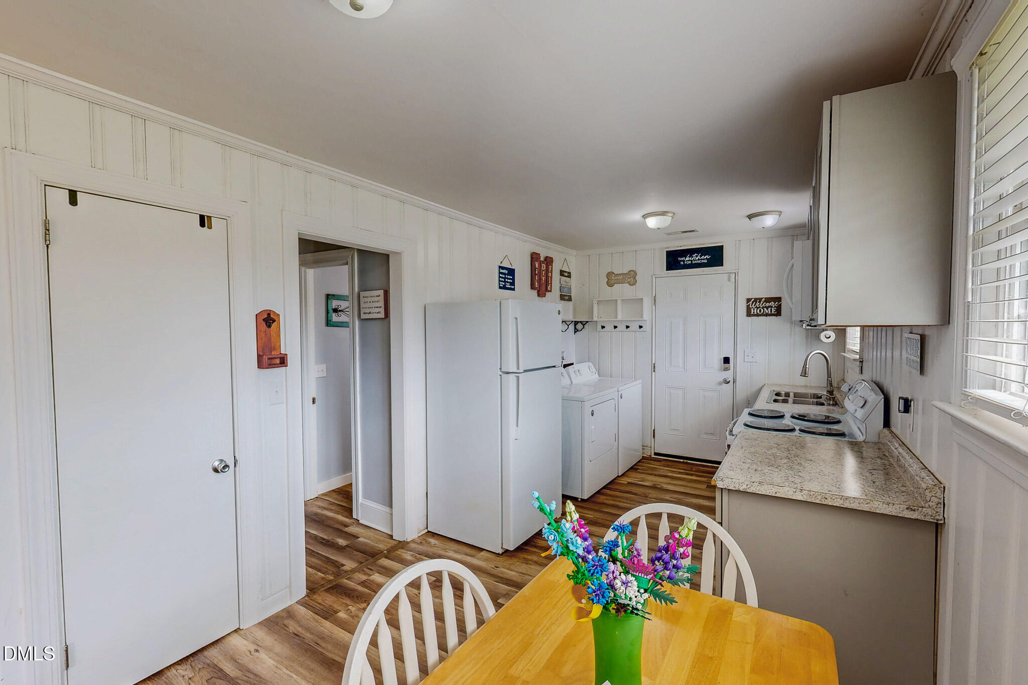1249 Pointer Street Roxboro, NC 27573 - Photo 12 of 22 a bedroom with furniture and a wooden floor