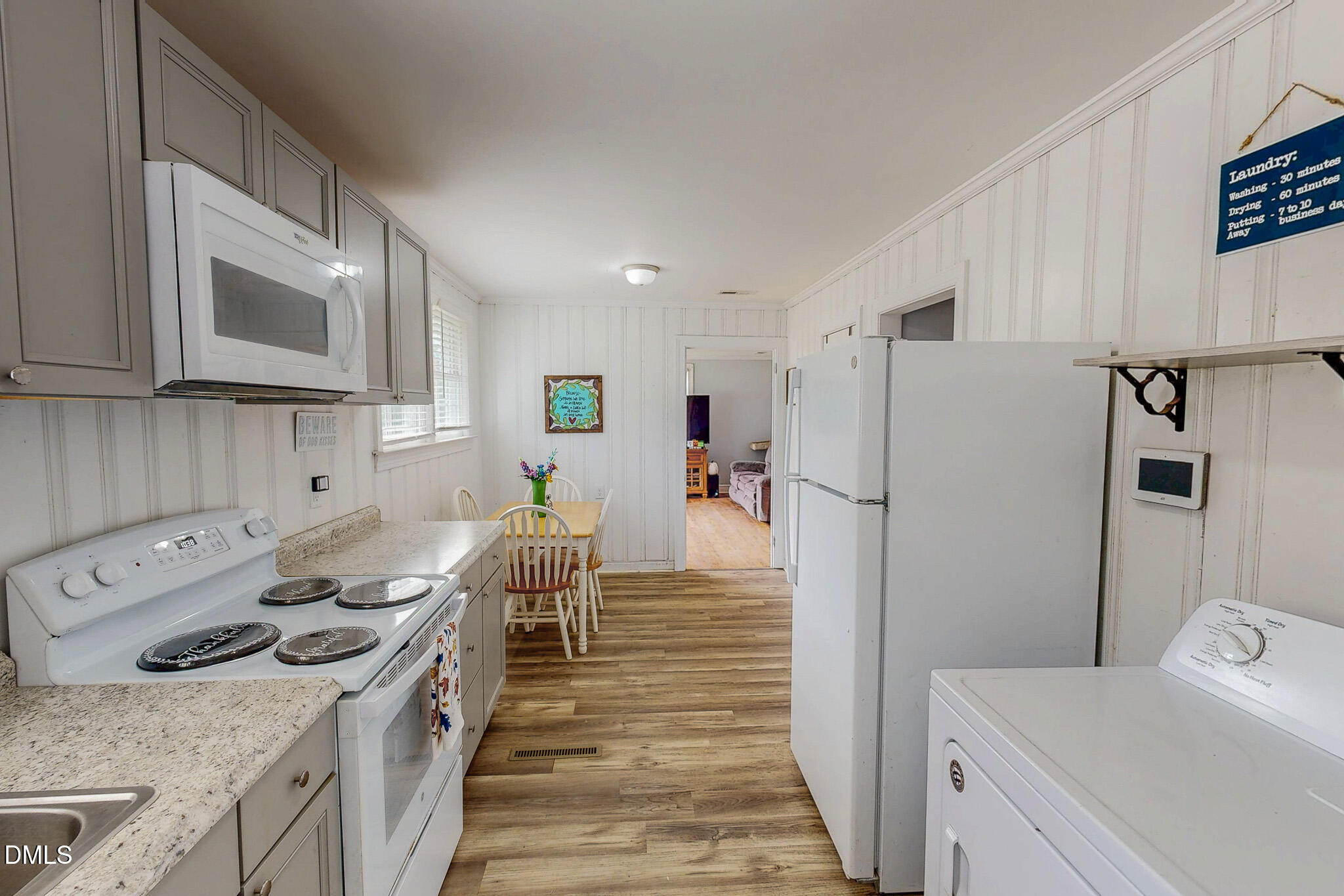 1249 Pointer Street Roxboro, NC 27573 - Photo 15 of 22 a kitchen with stainless steel appliances granite countertop a refrigerator stove microwave and sink