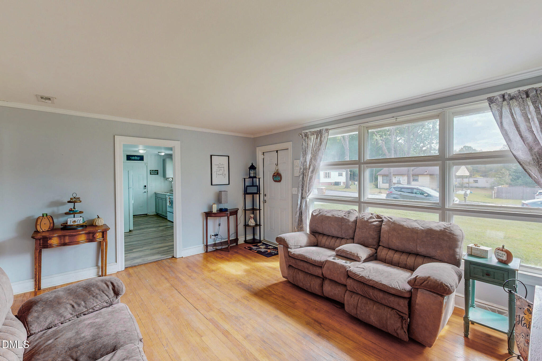 1249 Pointer Street Roxboro, NC 27573 - Photo 2 of 22 a living room with furniture and a large window