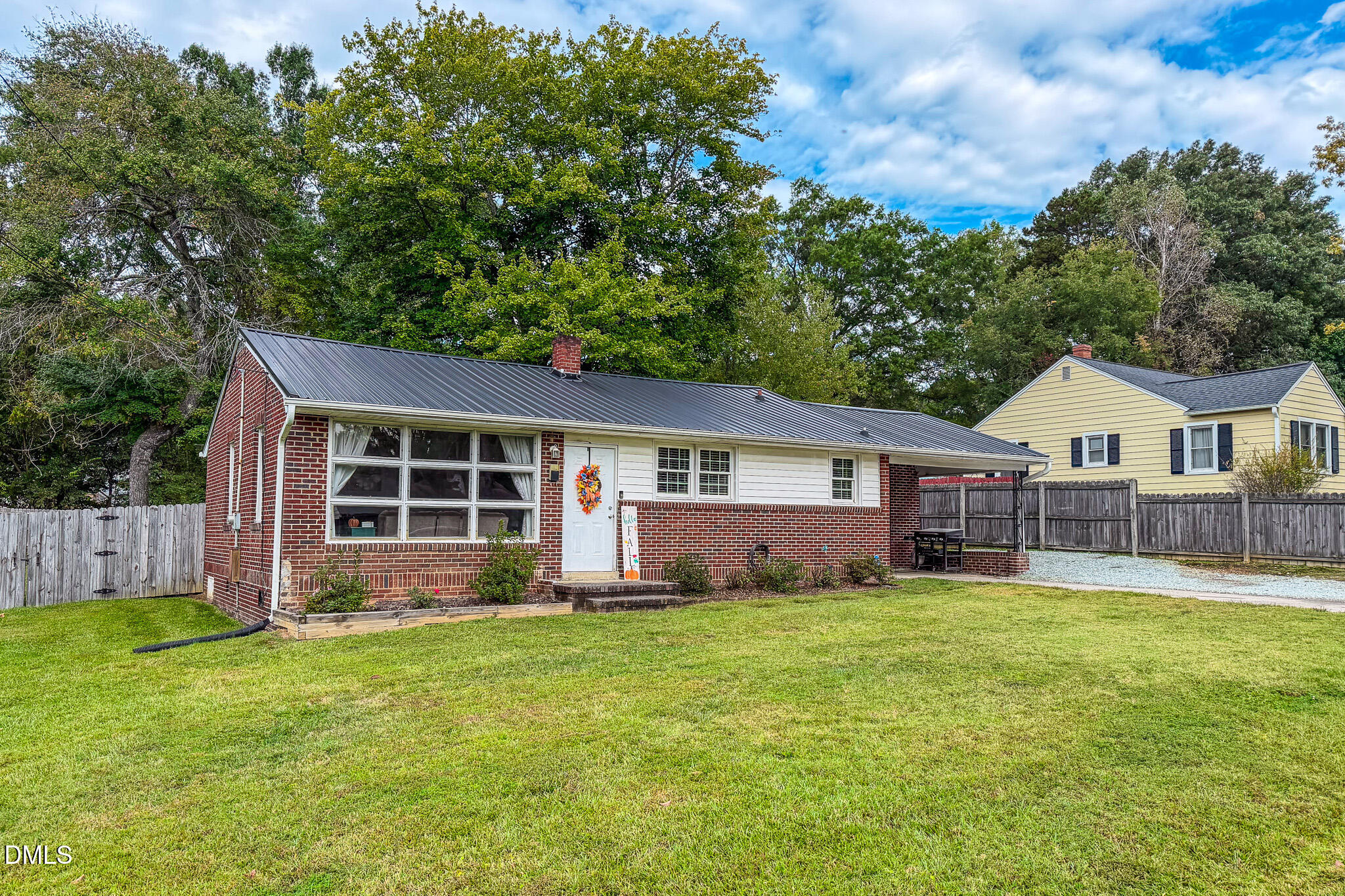 1249 Pointer Street Roxboro, NC 27573 - Photo 22 of 22 a view of a house with a yard and pathway