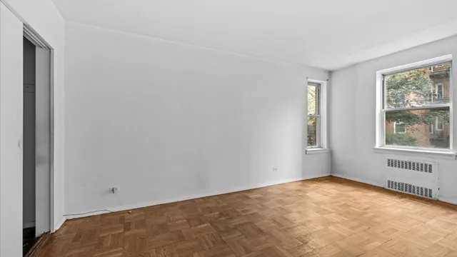 an empty room with windows