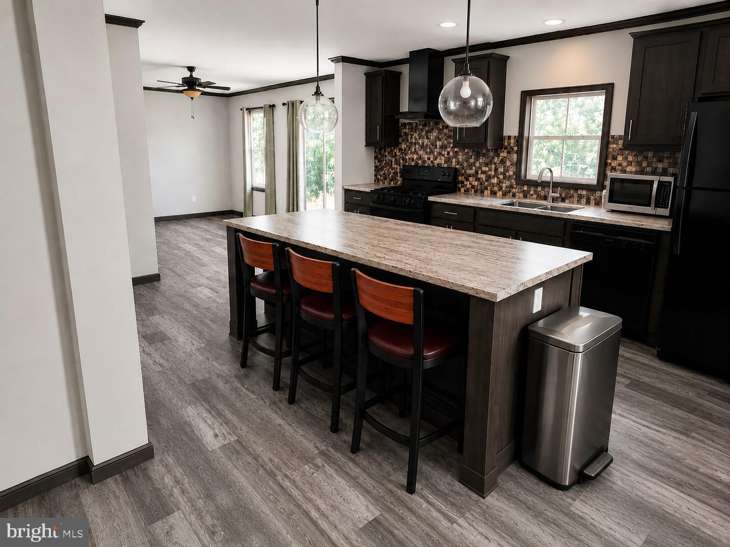 600 Ridge Road Dillsburg, PA 17019 - Photo 3 of 15 a kitchen with a table chairs and wooden floor