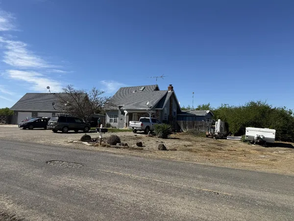 a car parked in front of a house