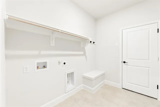 a white bath tub sitting next to a white toilet