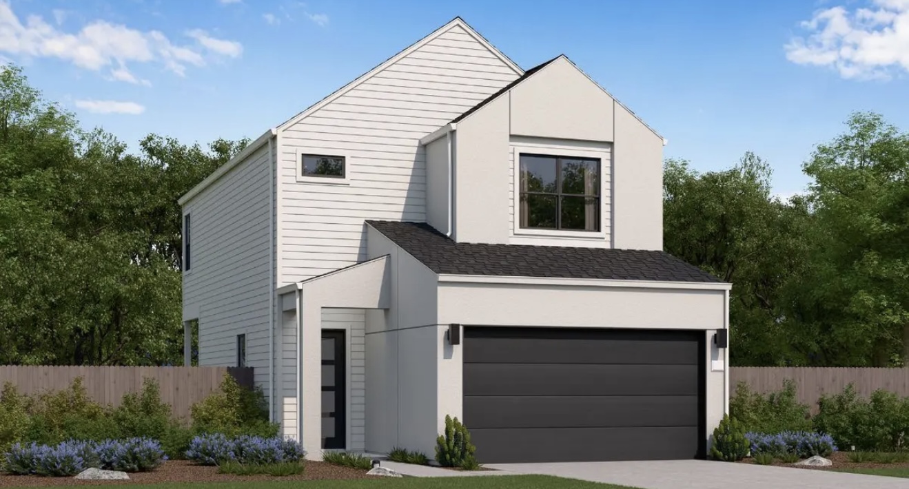 a front view of a house with garage