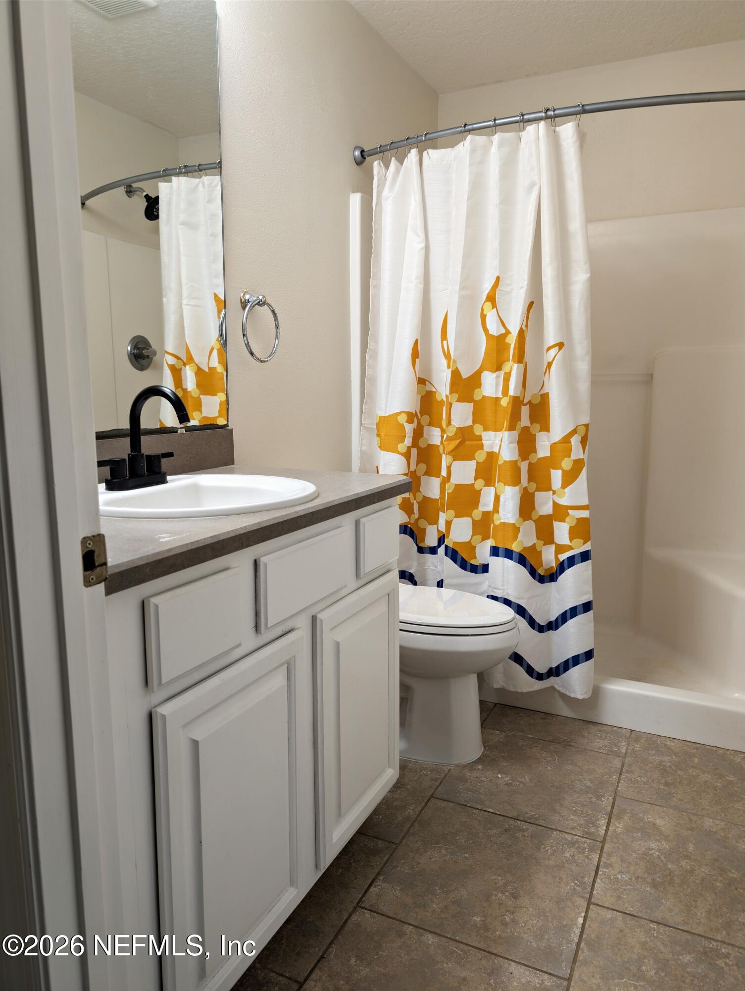 7 Arthur Street St. Augustine, FL 32084 - Photo 21 of 30 a bathroom with a sink toilet and shower