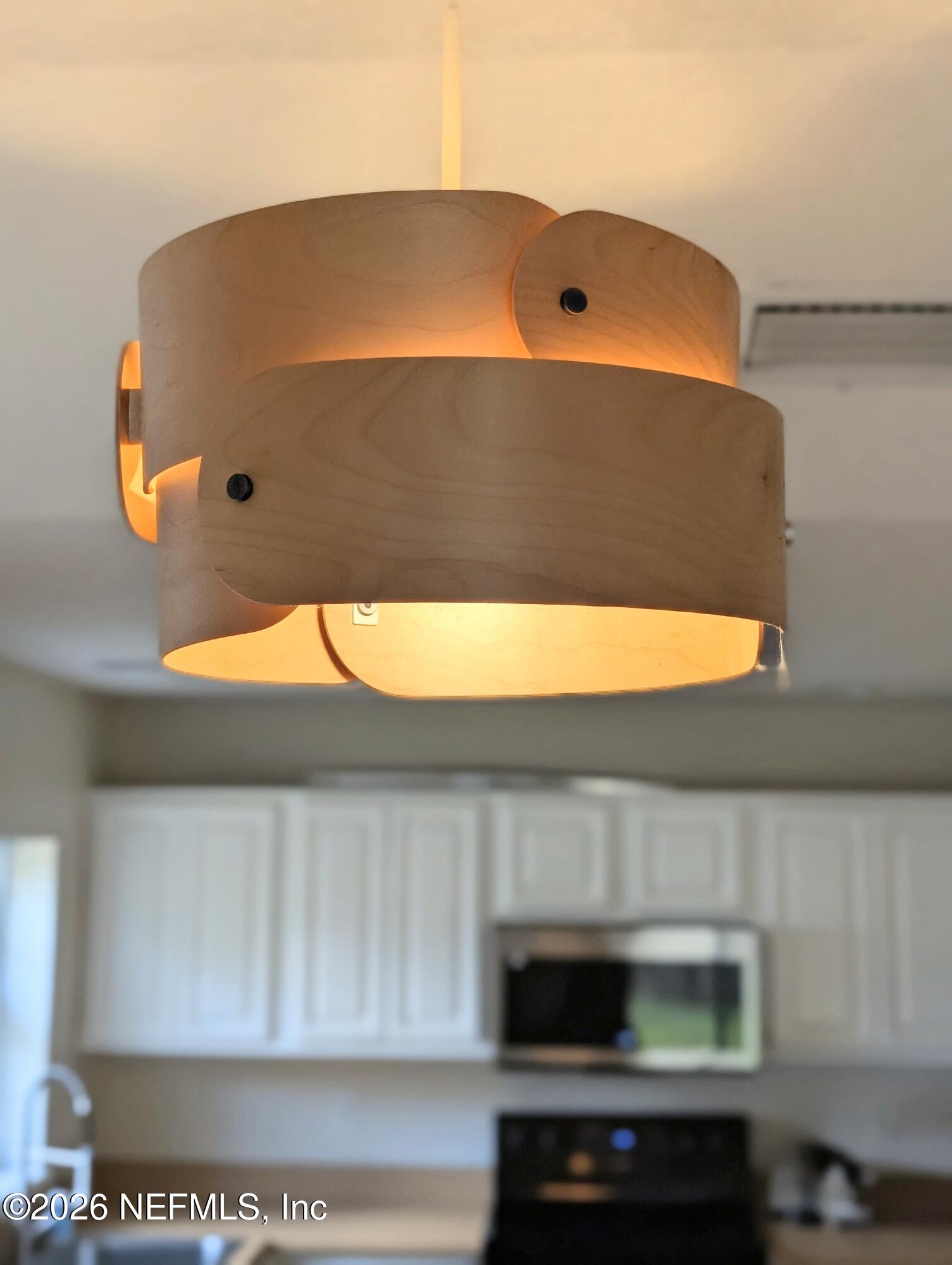 7 Arthur Street St. Augustine, FL 32084 - Photo 23 of 30 a bathroom with a sink and a mirror